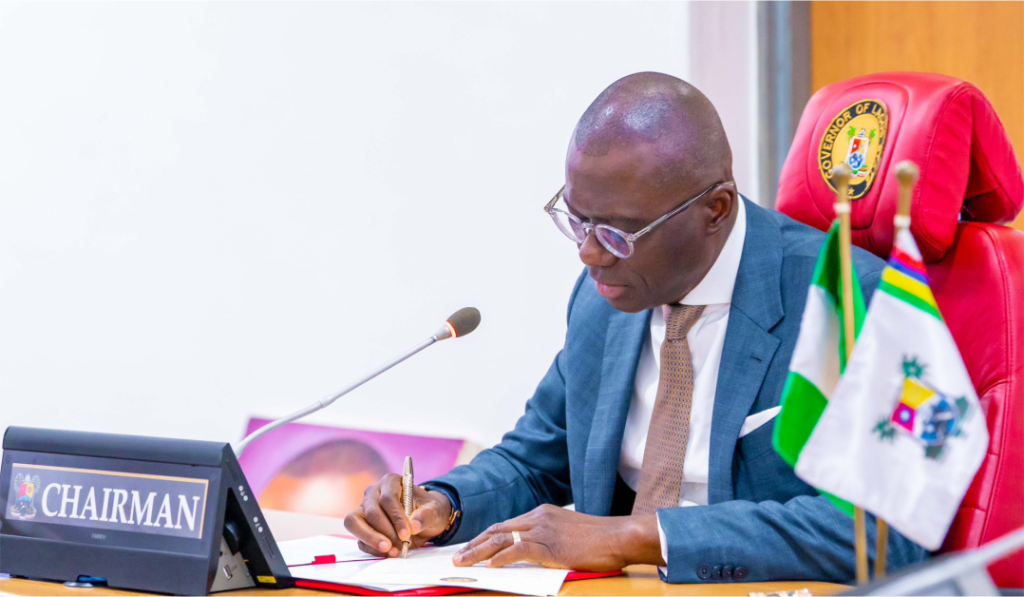 Lagos State Governor Babajide Sanwo Olu Signing A Document