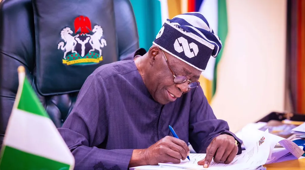 President Bola Ahmed Tinubu Signing Documents