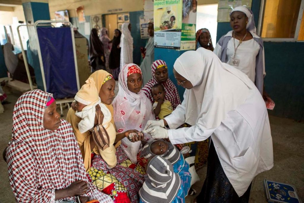 Trained Health Workers Attending Patients At A Health Facility