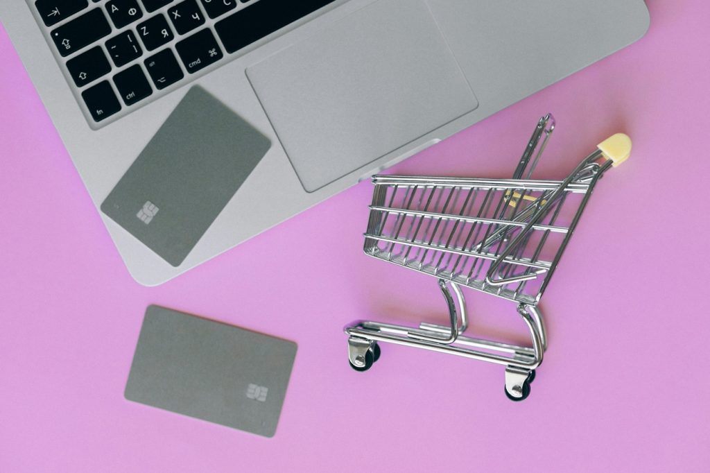 E Commerce. A Laptop Cards And Cart