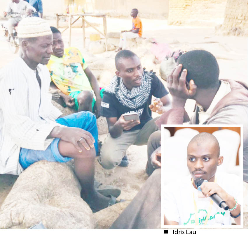 Idris Discussing With Youths