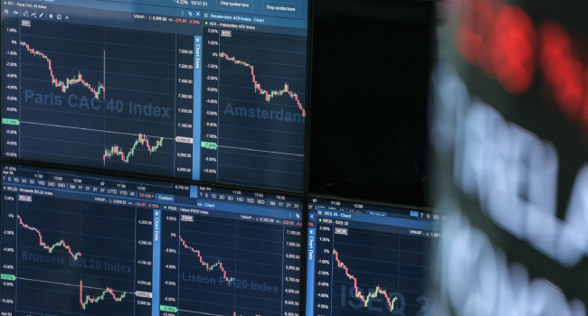 Market Indicators Are Displayed On Digital Screen At The Euronext Trading Exchange Building In La De