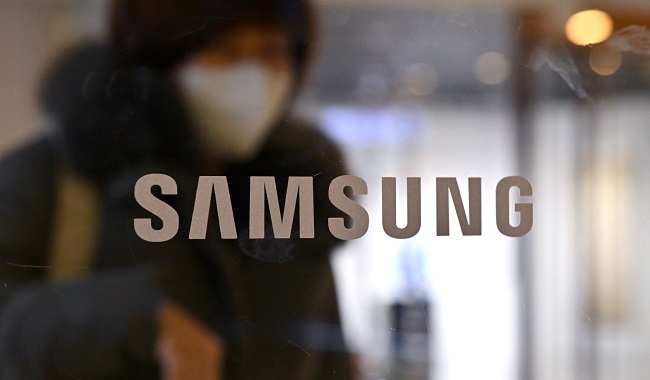 Samsung Logo Displayed On A Glass Door At The Companys Seocho Building In Seoul 1 1