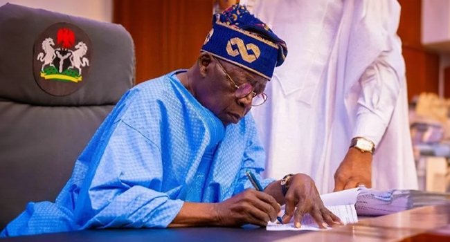 Tinubu Signing