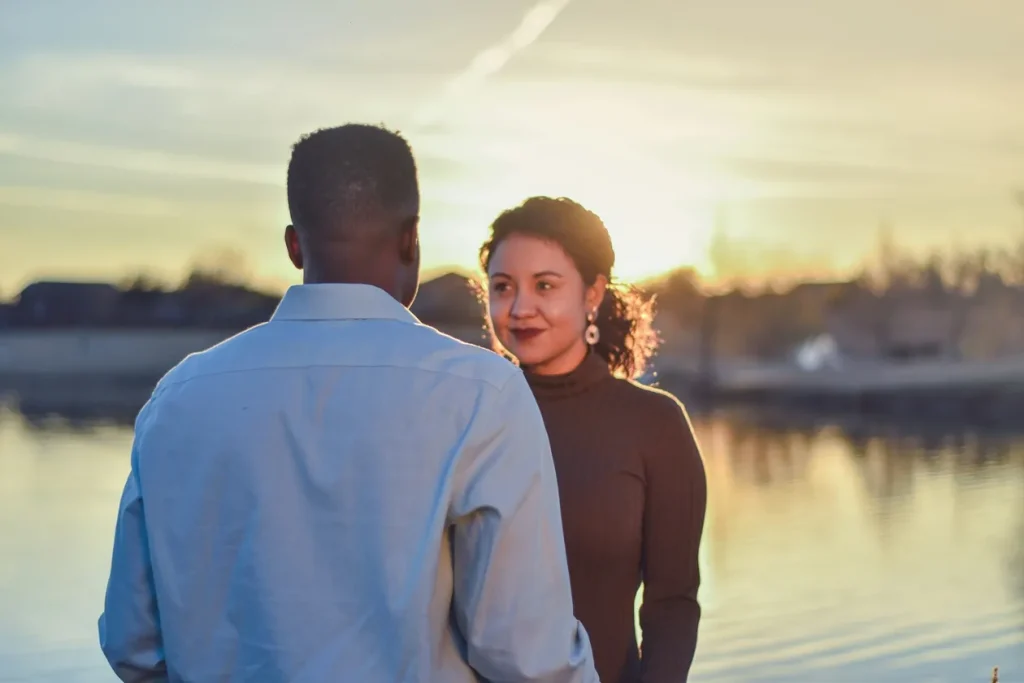 A Man And Woman Facing Each Other A Man And Woman Facing Each Other