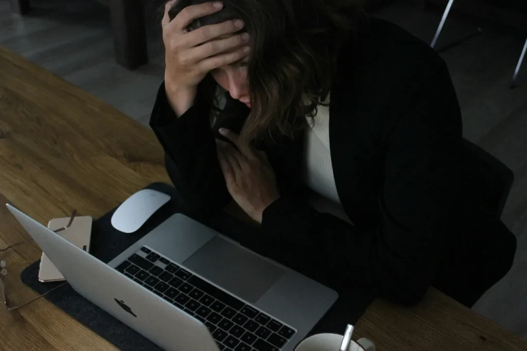 A Woman With Her Head Down