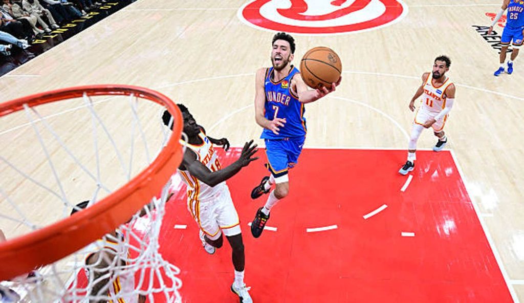 Atlanta Ga Chet Holmgren Of The Oklahoma City Thunder Drives To The Basket As Mouhamed Gueye
