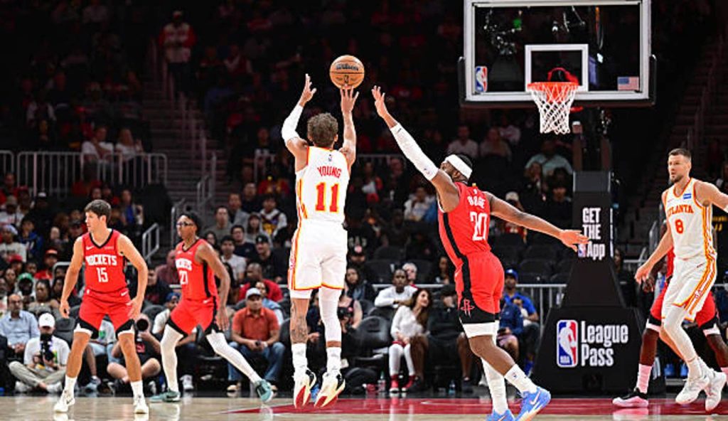 Atlanta Ga Trae Young Of The Atlanta Hawks Shoots A Three Point Basket During The Game