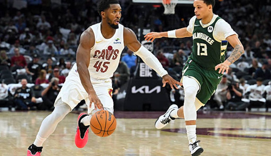 Cleveland Ohio Guard Donovan Mitchell Of The Cleveland Cavaliers Drives To The Basket Around