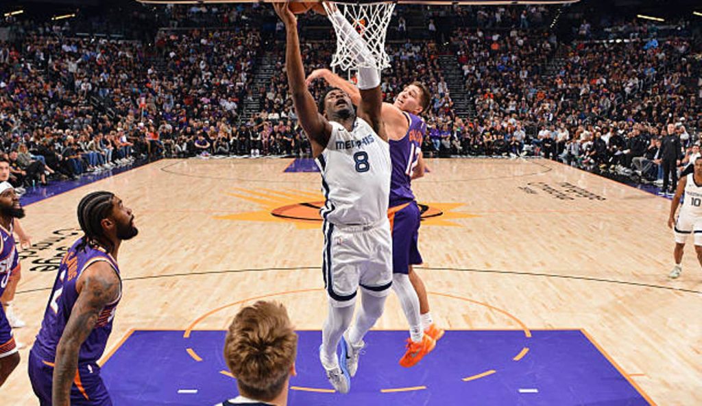 Phoenix Az Jaren Jackson Jr 8 Of The Memphis Grizzlies Drives To The Basket During The Game Phoenix Az Jaren Jackson Jr 8 Of The Memphis Grizzlies Drives To The Basket During The Game
