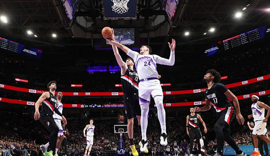 Salt Lake City Ut Walker Kessler Of The Utah Jazz Drives To The Basket As Donovan Clingan Of Salt Lake City Ut Walker Kessler Of The Utah Jazz Drives To The Basket As Donovan Clingan Of