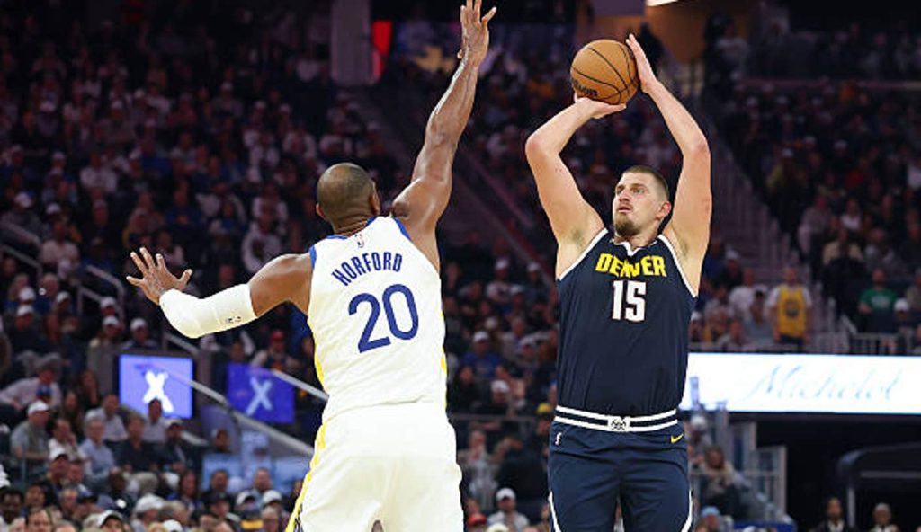 San Francisco California Nikola Jokic Of The Denver Nuggets Shoots Over Al Horford Of The
