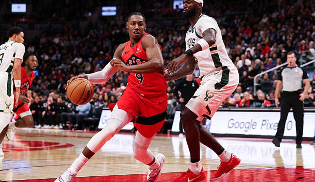 Toronto Canada Rj Barrett Of The Toronto Raptors Dribbles The Ball Against Bobby Portis Of Toronto Canada Rj Barrett Of The Toronto Raptors Dribbles The Ball Against Bobby Portis Of
