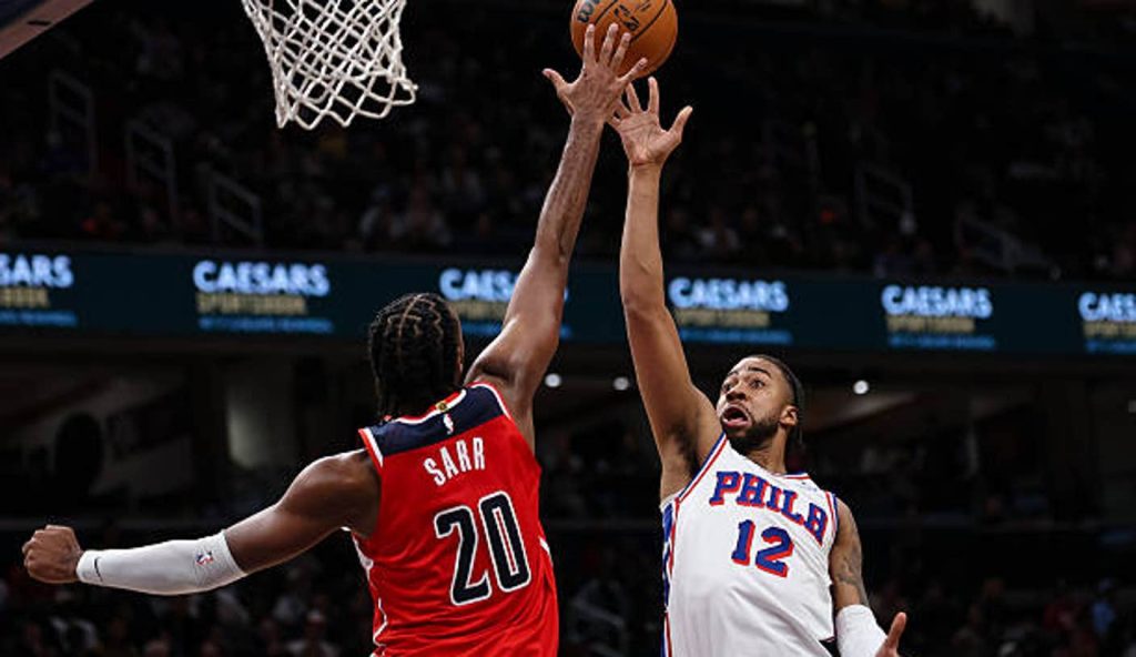 Washington Dc Trendon Watford Of The Philadelphia 76Ers Shoots The Ball Against Alex Sarr Of