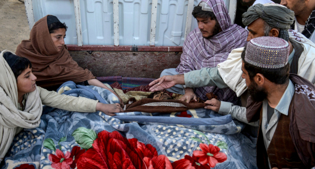Graphic Content Afghan Men Gesture As They Sit Beside The Dead Bodies Of Victims Who Were Killed F Graphic Content Afghan Men Gesture As They Sit Beside The Dead Bodies Of Victims Who Were Killed F