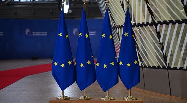 This Photograph Taken On December 15 2023 Shows Lined Up Flags Of The European Union Eu On Display At The European Headquarters During The European Union Summit In Brussels