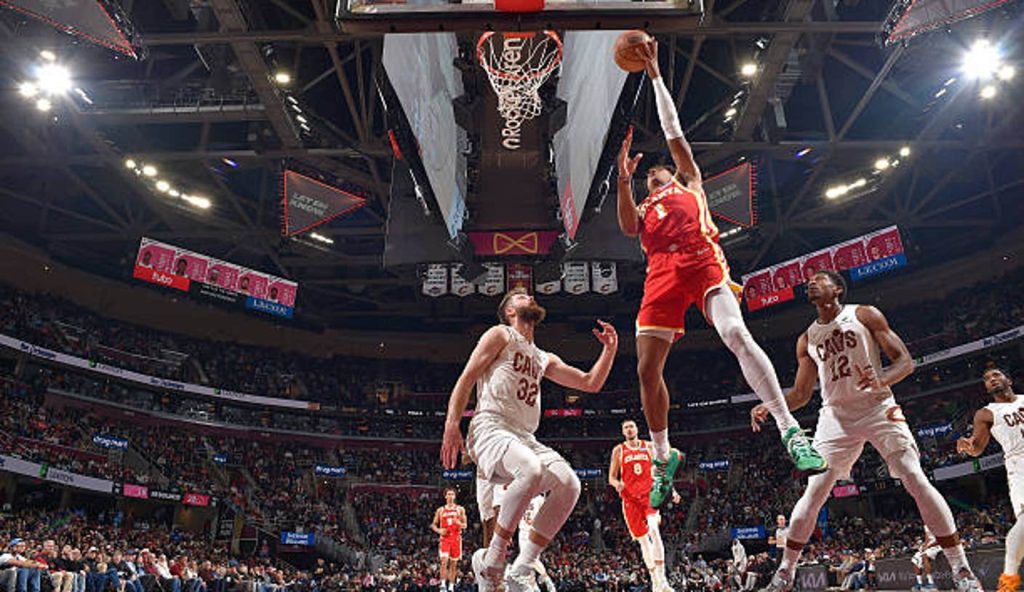 Cleveland Oh Jalen Johnson Of The Atlanta Hawks Drives To The Basket As Dean Wade And Deandre