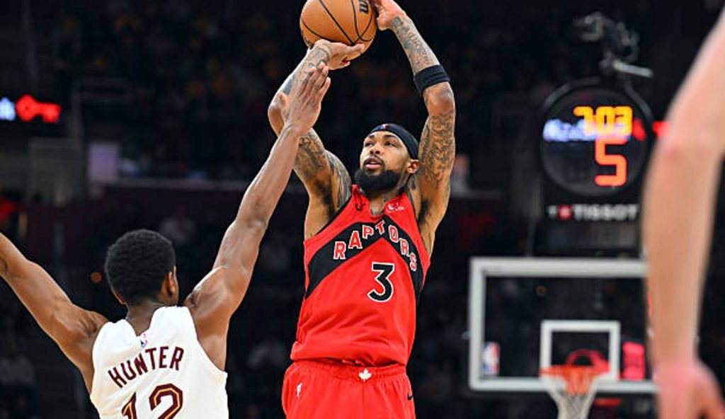 Cleveland Ohio Forward Brandon Ingram Of The Toronto Raptors Shoots Over Forward Deandre Cleveland Ohio Forward Brandon Ingram Of The Toronto Raptors Shoots Over Forward Deandre