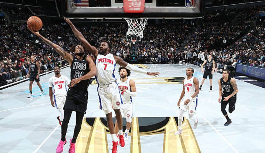 New York Ny Nic Claxton Of The Brooklyn Nets Drives To The Basket As Paul Reed Of The Detroit