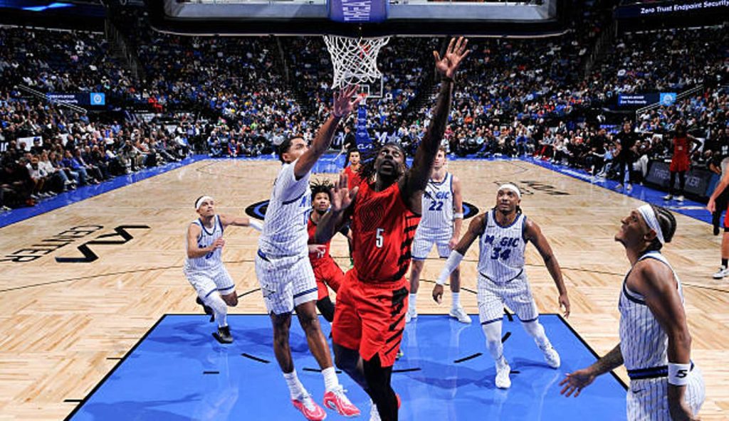 Orlando Fl Jrue Holiday Of The Portland Trail Blazers Shoots The Ball During The Game Against