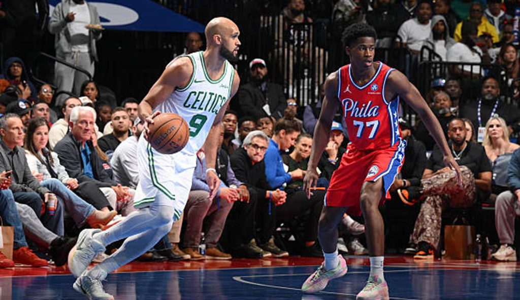 Philadelphia Pa Derrick White Of The Boston Celtics Drives To The Basket As Vj Edgecombe Of Philadelphia Pa Derrick White Of The Boston Celtics Drives To The Basket As Vj Edgecombe Of