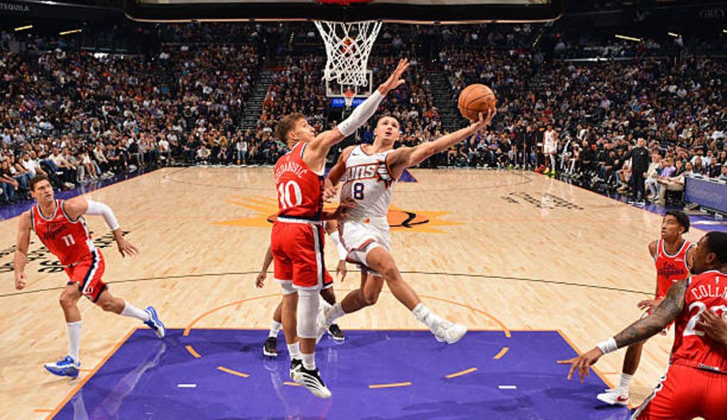 Phoenix Az Grayson Allen Of The Phoenix Suns Drives To The Basket During The Game Against The Phoenix Az Grayson Allen Of The Phoenix Suns Drives To The Basket During The Game Against The